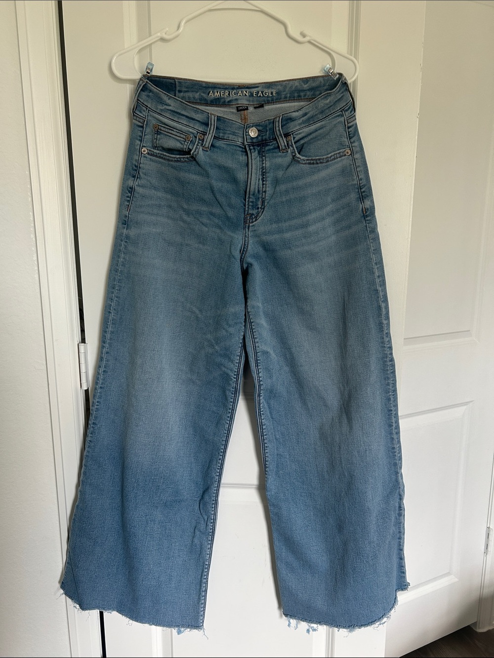 American Eagle Outfitters Light Blue Wide-Leg Jeans with Raw Hem
